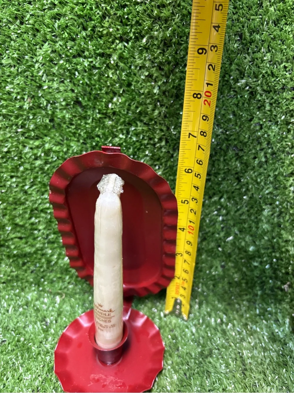 Red Primitive metal hanging candle holder with white candle